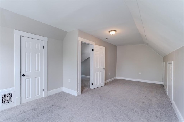 33-35 Claremont St, Springfield, MA 01108 - bonus room with vaulted ceiling, carpet flooring, and baseboards