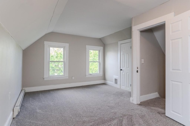 33-35 Claremont St, Springfield, MA 01108 - bonus room featuring baseboard heating, carpet, lofted ceiling, and baseboards
