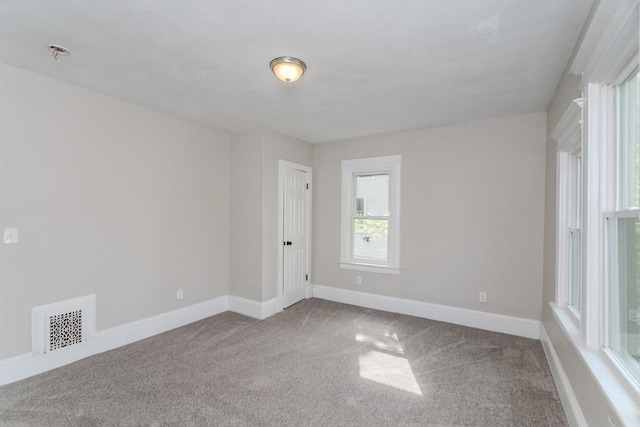 33-35 Claremont St, Springfield, MA 01108 - carpeted spare room featuring baseboards and fire sprinkler in ceiling