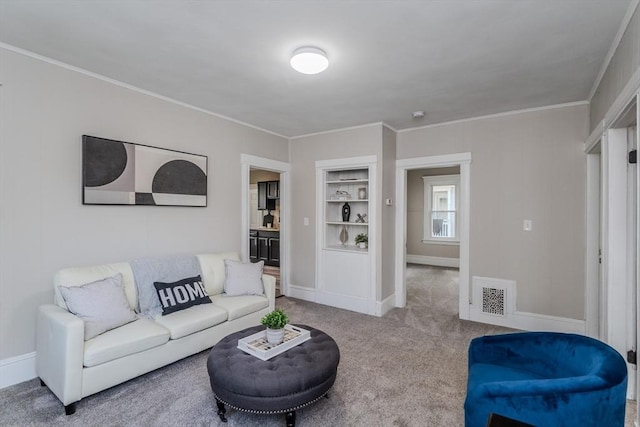 33-35 Claremont St, Springfield, MA 01108 - living room with built in features, carpet floors, crown molding, and baseboards