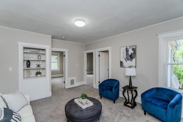 33-35 Claremont St, Springfield, MA 01108 - carpeted living room with crown molding and baseboards
