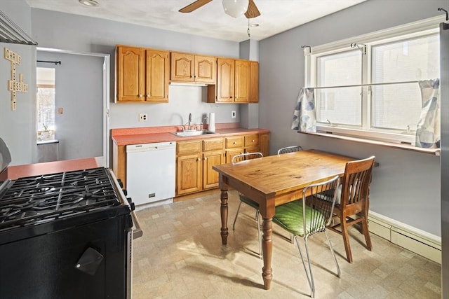 kitchen with ceiling fan, dishwasher, sink, and range with gas cooktop