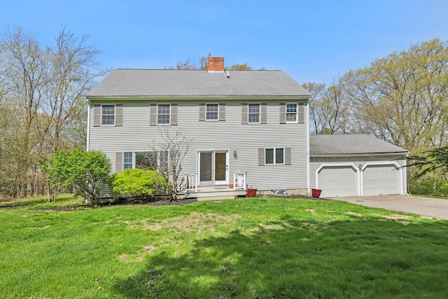 89 Brush Hill Rd, Sherborn, MA 01770 - colonial-style house featuring a garage, a chimney, driveway, and a front yard