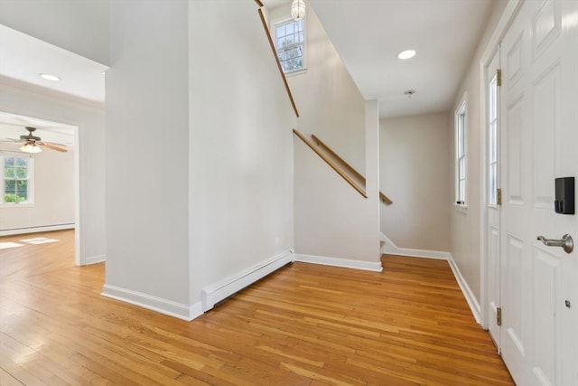 89 Brush Hill Rd, Sherborn, MA 01770 - foyer featuring baseboards, light wood finished floors, and a baseboard radiator