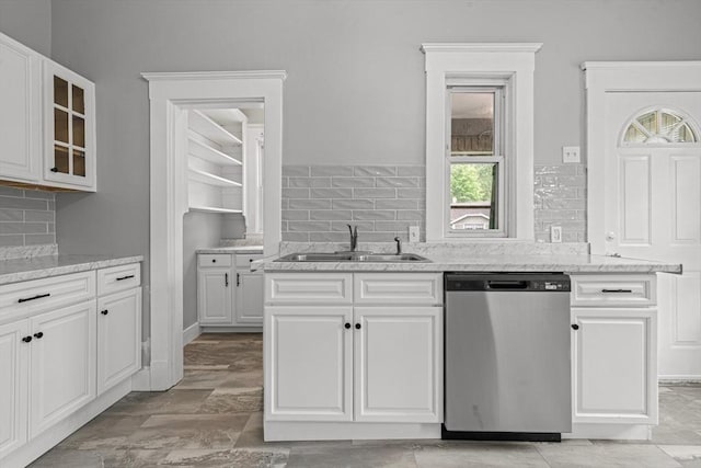 50 Switzer Ave, Springfield, MA 01109 - kitchen with dishwasher, tasteful backsplash, and white cabinets