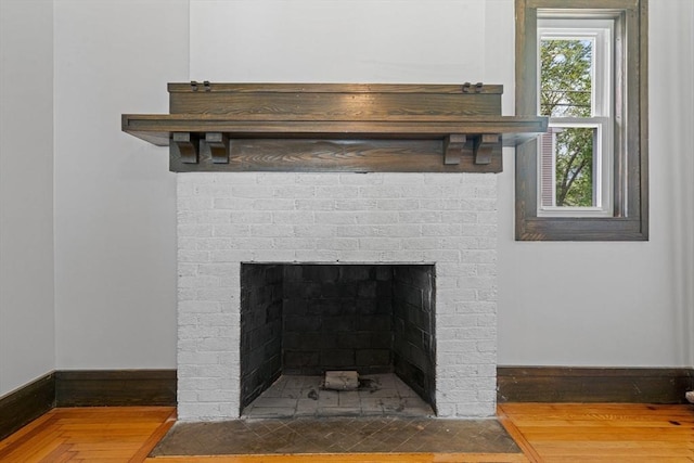 50 Switzer Ave, Springfield, MA 01109 - detailed view of a fireplace and wood finished floors