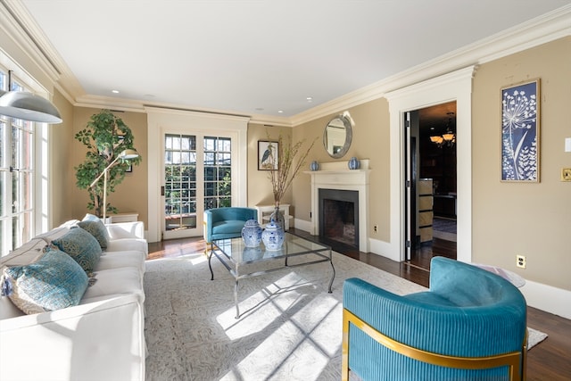 living room with ornamental molding and wood-type flooring