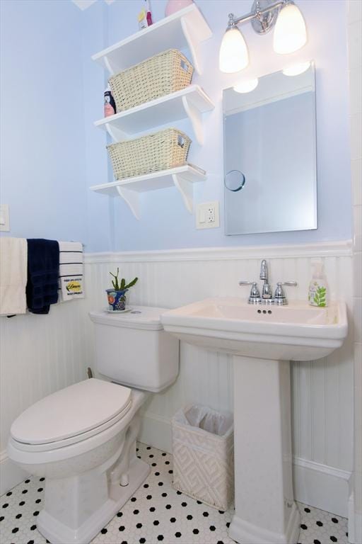 27 Ocean Ave Unit 1, Salem, MA 01970 - half bathroom with toilet and wainscoting