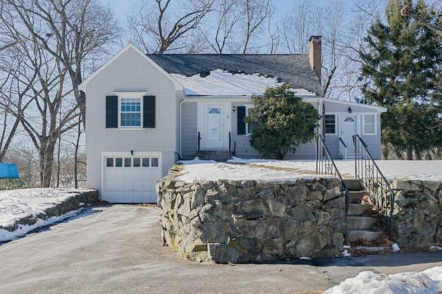 view of front of home with a garage