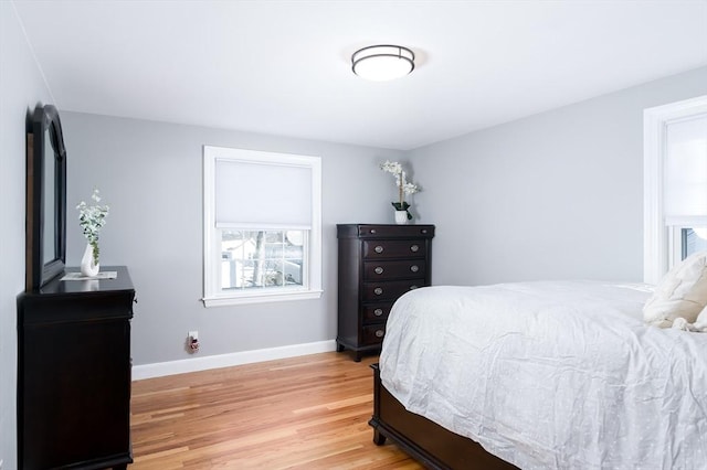 bedroom with wood-type flooring