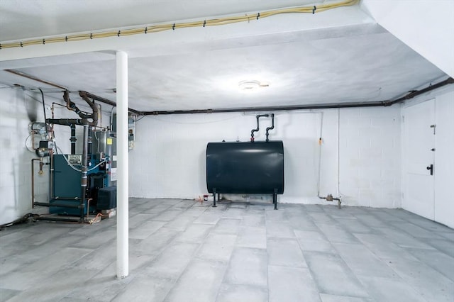 basement featuring gas water heater