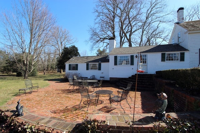 back of property with a patio area