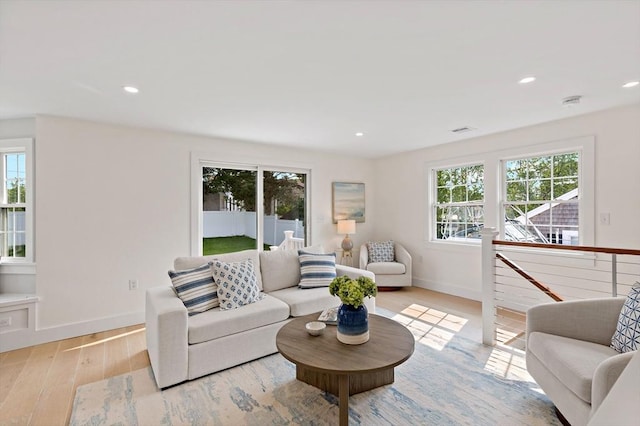 33 Dexter Ave, Sandwich, MA 02563 - living area featuring healthy amount of natural light, light wood-style floors, baseboards, and recessed lighting