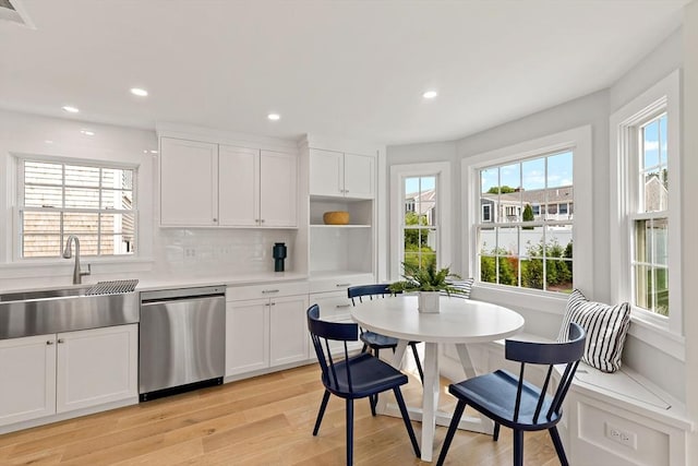 33 Dexter Ave, Sandwich, MA 02563 - kitchen with dishwasher, healthy amount of natural light, light wood finished floors, a sink, and recessed lighting
