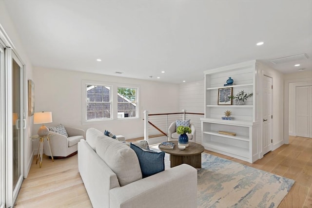 33 Dexter Ave, Sandwich, MA 02563 - living area with light wood-style flooring, recessed lighting, baseboards, and built in features
