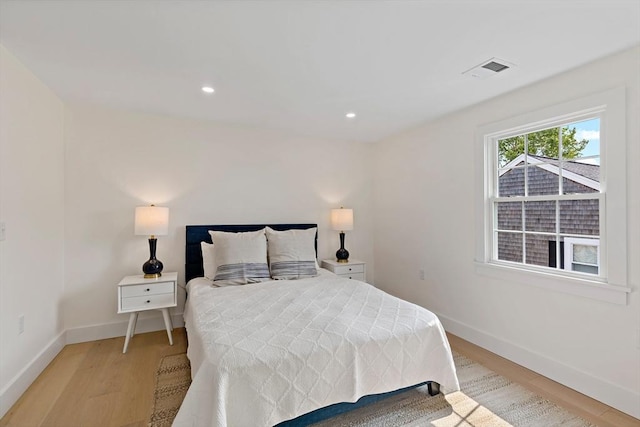 33 Dexter Ave, Sandwich, MA 02563 - bedroom with light wood-style floors, baseboards, and recessed lighting