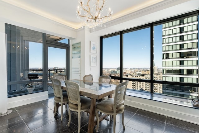 tiled dining room featuring crown molding, an inviting chandelier, and a healthy amount of sunlight