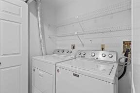 washroom with washer and dryer and laundry area