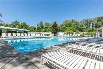 pool featuring a patio area
