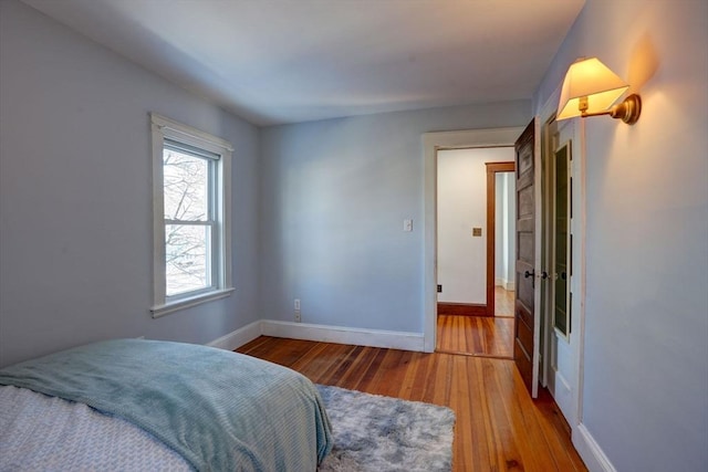 bedroom featuring hardwood / wood-style flooring