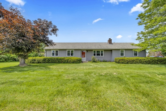 1032 Tinkham Rd, Wilbraham, MA 01095 - ranch-style home featuring a chimney and a front lawn