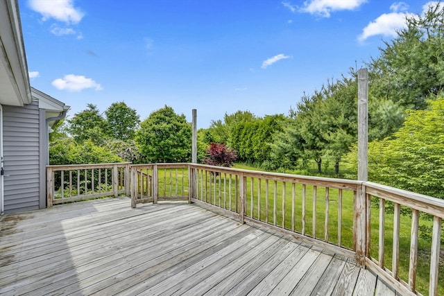 1032 Tinkham Rd, Wilbraham, MA 01095 - deck with view of wooded area and a lawn