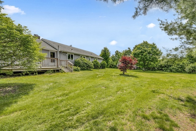 1032 Tinkham Rd, Wilbraham, MA 01095 - view of green lawn with a deck