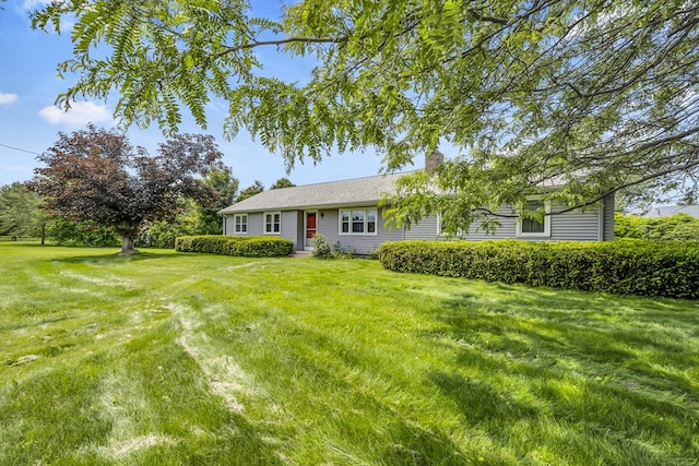 1032 Tinkham Rd, Wilbraham, MA 01095 - view of front facade with a front lawn and a chimney