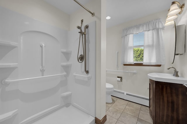 1032 Tinkham Rd, Wilbraham, MA 01095 - full bathroom featuring a baseboard heating unit, a shower, vanity, and toilet