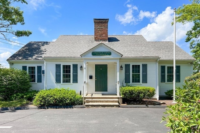 24 Powderhorn Way, Sandwich, MA 02563 - bungalow-style house featuring a chimney and roof with shingles