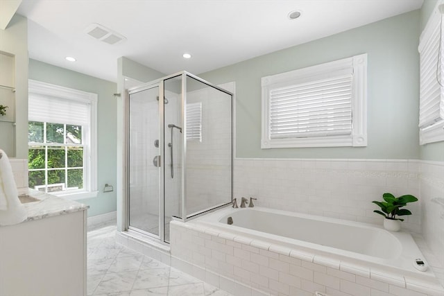 17 Perry St, Somerville, MA 02143 - full bath with a bath, a shower stall, marble look tiles, recessed lighting, and vanity
