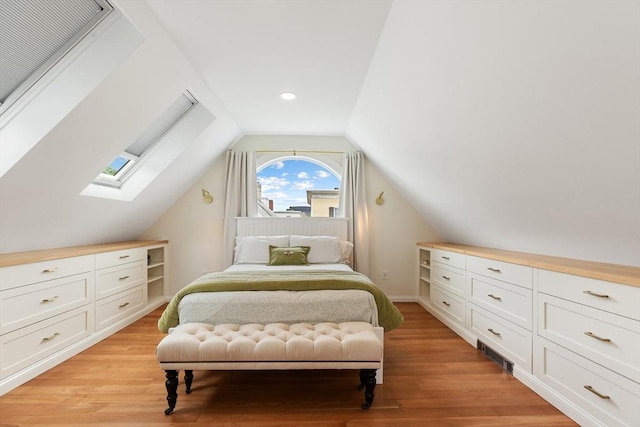 17 Perry St, Somerville, MA 02143 - bedroom featuring a skylight, vaulted ceiling, and light wood-style floors