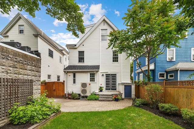 17 Perry St, Somerville, MA 02143 - rear view of house featuring a patio