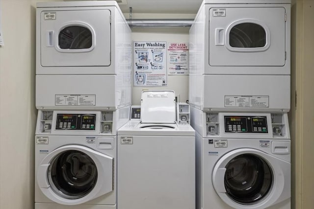 laundry area featuring washing machine and dryer and stacked washer and clothes dryer