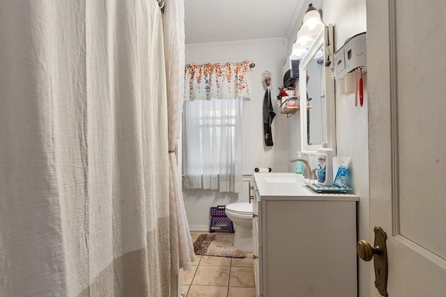 full bathroom with toilet, ornamental molding, tile patterned flooring, and vanity