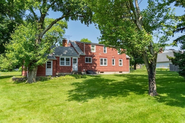 31 Melwood Ave, East Longmeadow, MA 01028 - rear view of house with a chimney and a lawn