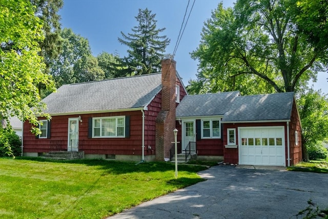 31 Melwood Ave, East Longmeadow, MA 01028 - view of front of house featuring an attached garage, a chimney, driveway, entry steps, and a shingled roof