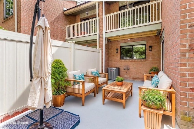 148 Greenbrook Dr Unit 69-6, Stoughton, MA 02072 - view of patio / terrace featuring an outdoor living space, central air condition unit, and a balcony