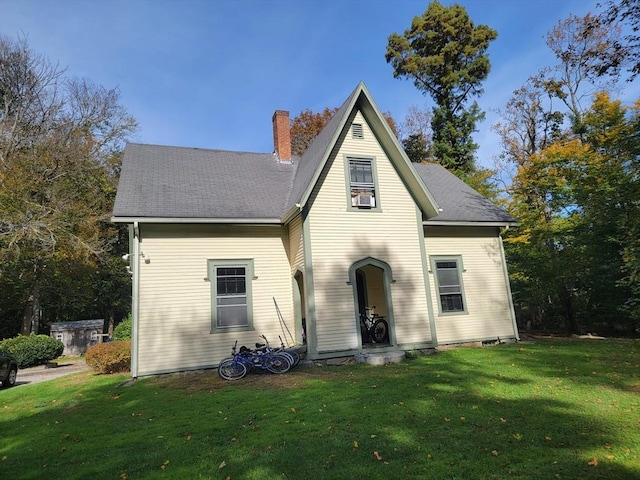 230 Summer St Unit 1, Plymouth, MA 02360 - view of front facade with roof with shingles, a chimney, and a front lawn