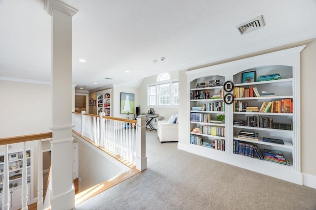 corridor with carpet and built in shelves