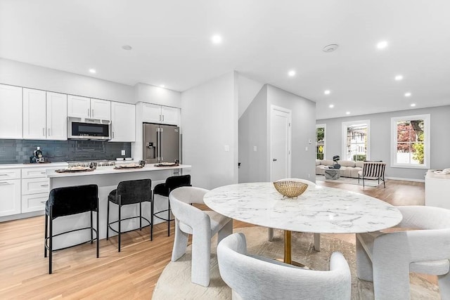 dining room featuring light hardwood / wood-style floors