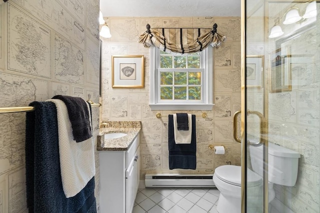 10 Granada Way, Andover, MA 01810 - bathroom with baseboard heating, tile patterned flooring, vanity, toilet, and a stall shower