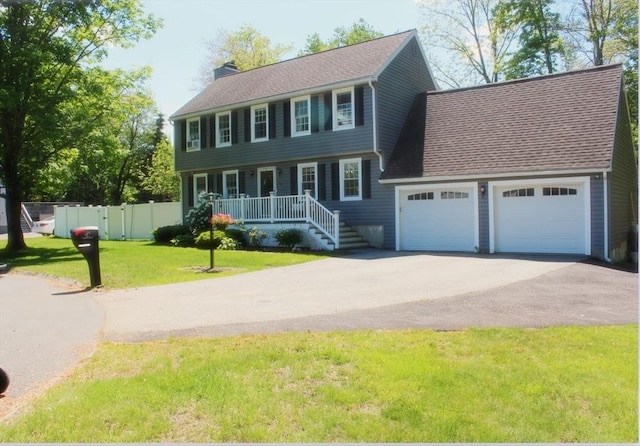 12 Bonin Dr, Haverhill, MA 01832 - colonial-style house featuring a chimney, driveway, an attached garage, a shingled roof, and a porch