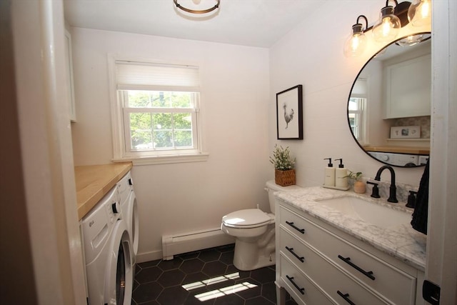 12 Bonin Dr, Haverhill, MA 01832 - bathroom featuring baseboard heating, vanity, toilet, and washer and clothes dryer