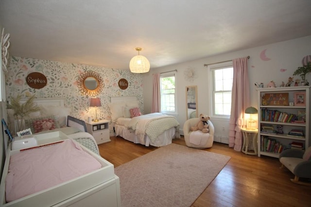 12 Bonin Dr, Haverhill, MA 01832 - bedroom with wood finished floors and wallpapered walls
