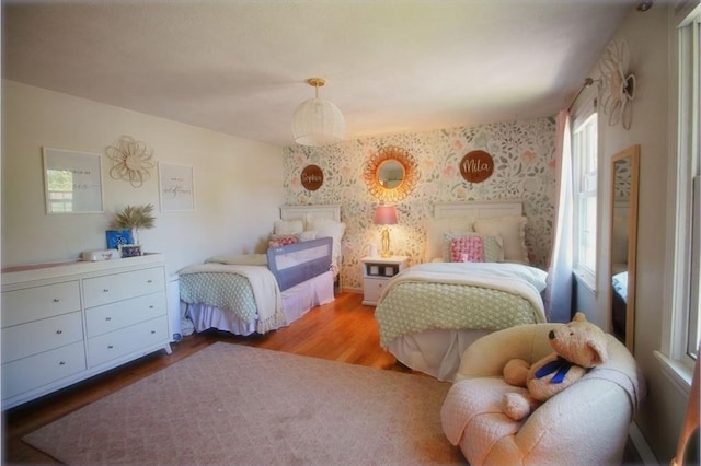 12 Bonin Dr, Haverhill, MA 01832 - bedroom featuring wood finished floors and wallpapered walls
