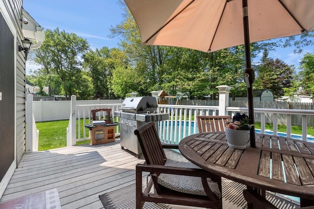 12 Bonin Dr, Haverhill, MA 01832 - wooden terrace with outdoor dining space and area for grilling