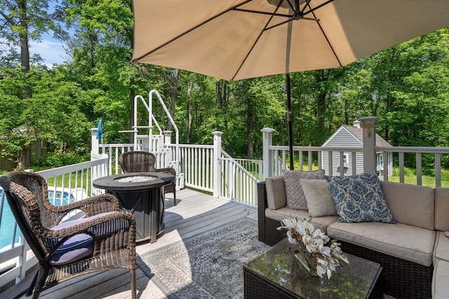 12 Bonin Dr, Haverhill, MA 01832 - wooden terrace with an outdoor living space with a fire pit and view of scattered trees