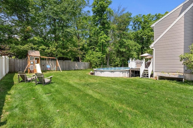 12 Bonin Dr, Haverhill, MA 01832 - view of yard with a playground and a wooden deck