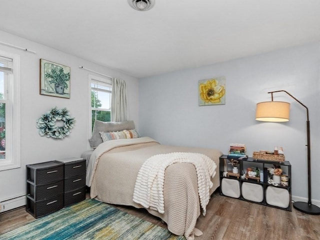 48 Twin Brook Ln, Taunton, MA 02780 - bedroom featuring wood finished floors and baseboard heating